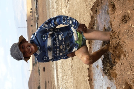 Making mud bricks in al Auja