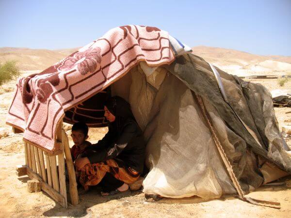 Palestinian residents of the Jordan Valley after a home demolition in June 2011 (Photo: Israeli Committee Against House Demolitions)