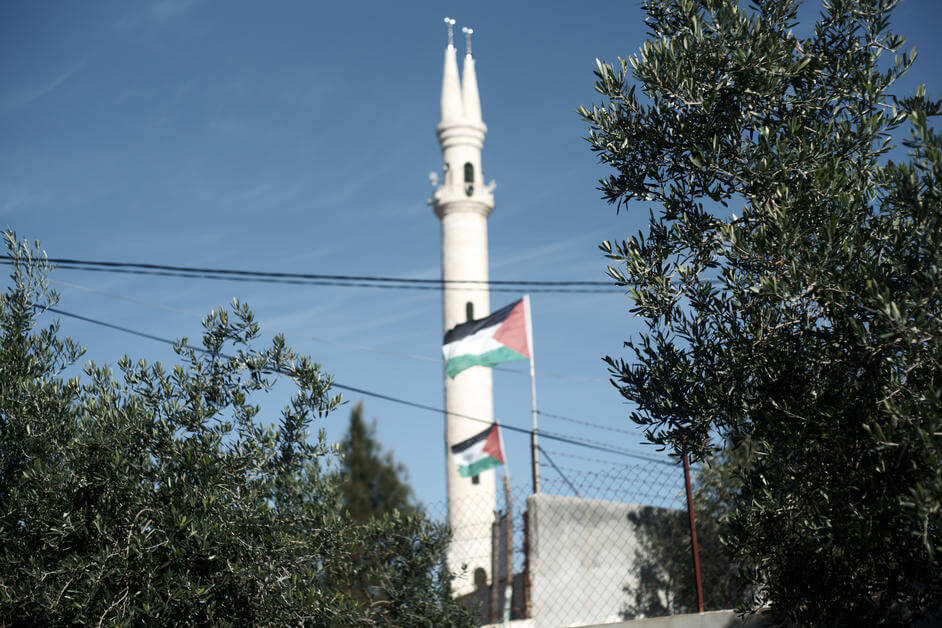 Since 2003 a mosque with a double minaret forming a peace sign has towered over al-Aqaba. Israel has issued demolition orders against the mosque — along with a clinic and a kindergarden — because it was built without a permit (Israel permits buildings in areas under full military control only with great exception).