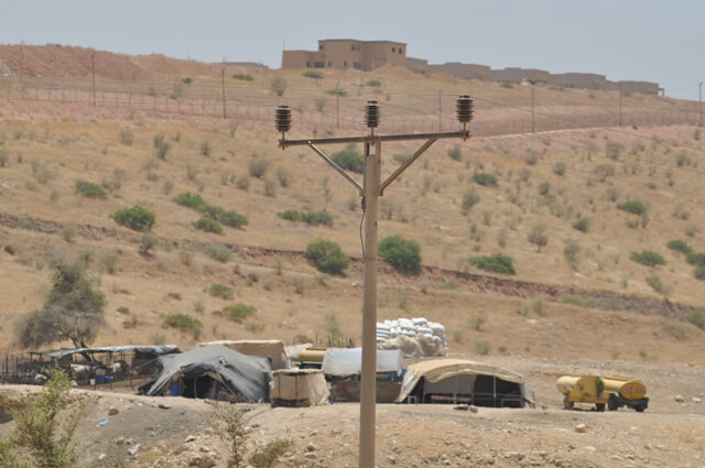 Electricity pylons running over bedouin communities to Maskiyyot settlement
